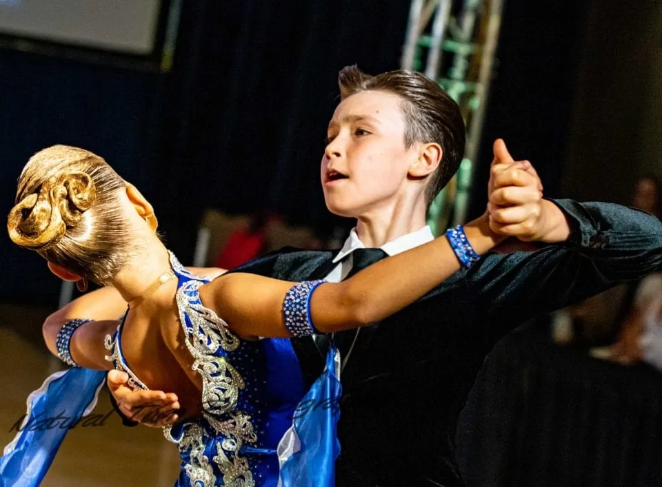 Junior couple competing in Latin costume