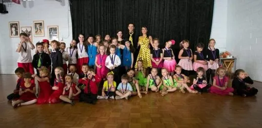 Group of junior students with their coaches