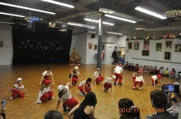 Junior students celebrating after a performance