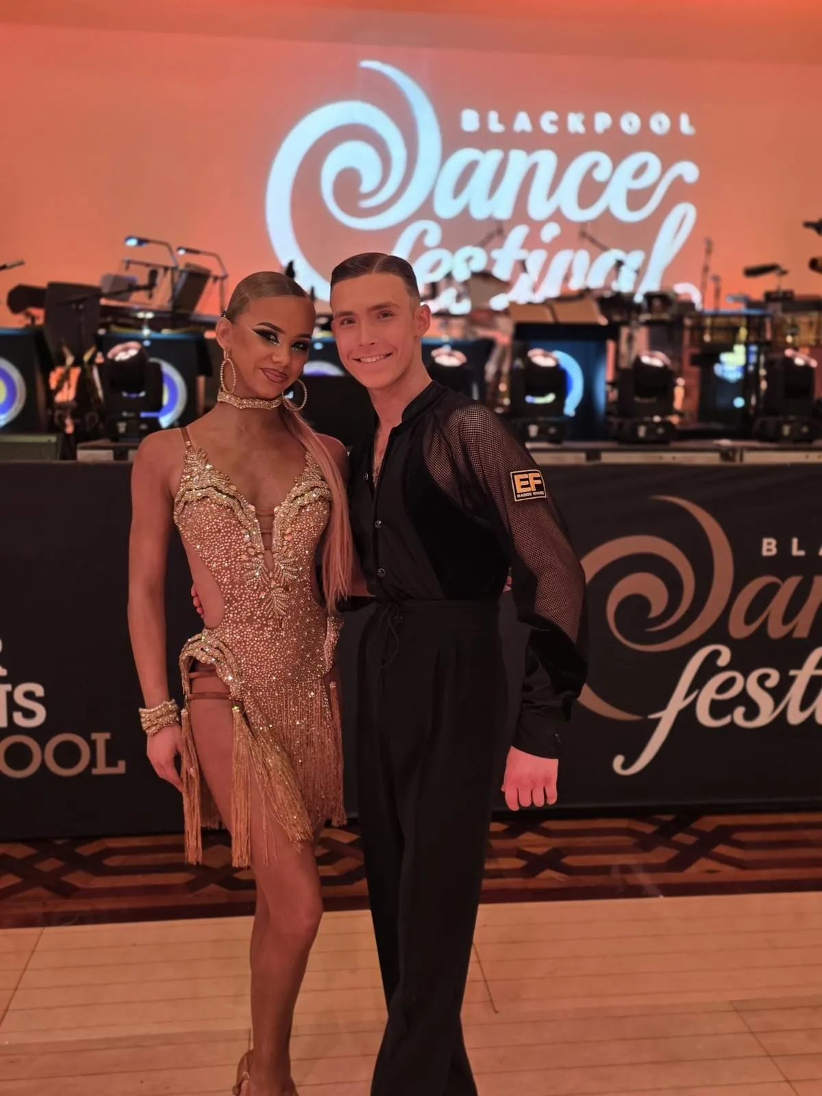 Sophia Baydala and Andrey Ilyushenov posing together at the Blackpool Dance Festival
